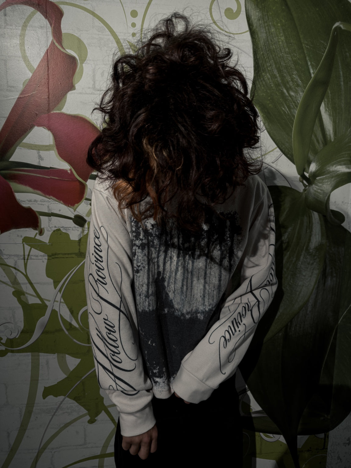 Lost Eden Thermal on model with crossed sleeves