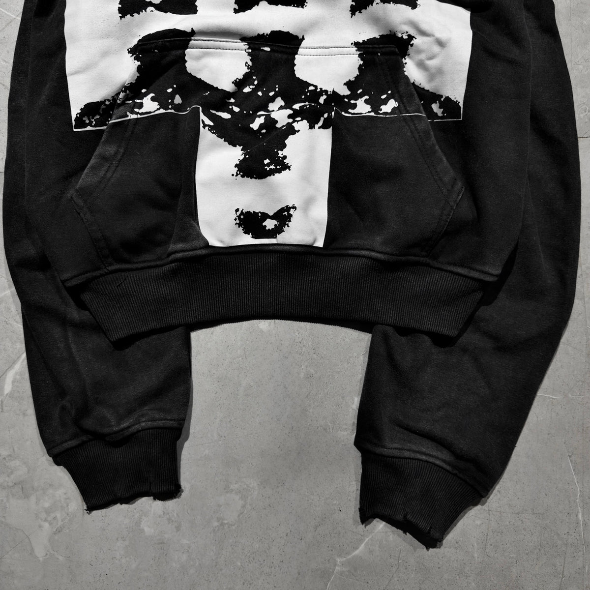 Missing Faces Hoodie graphic, kangaroo pocket and cuff detail